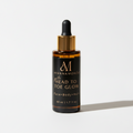 Ayannamonéa skincare serum bottle on a white background
